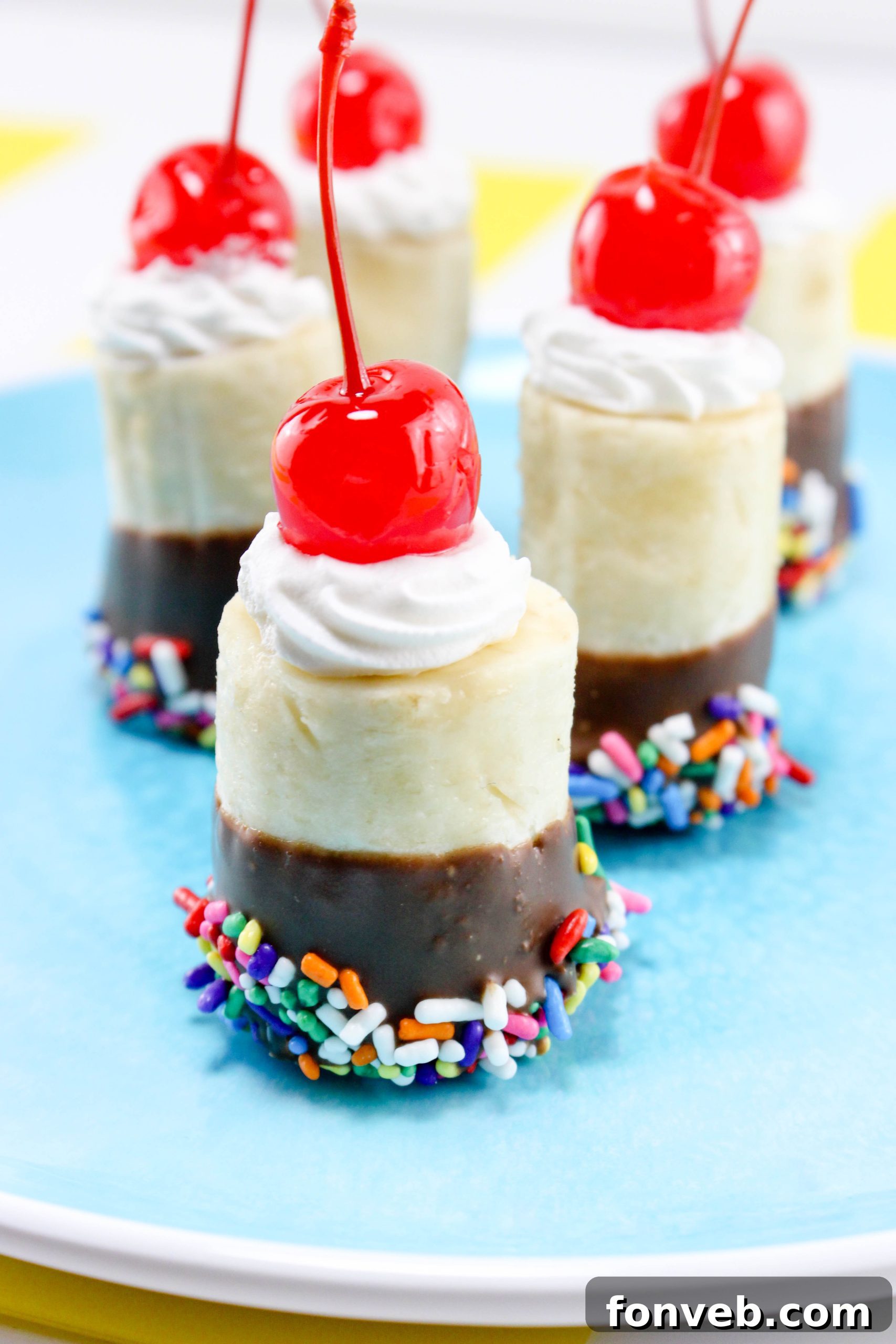 Banana Split Delights 5 Hands piping whipped topping onto chocolate-dipped banana segments, illustrating the simple assembly process.