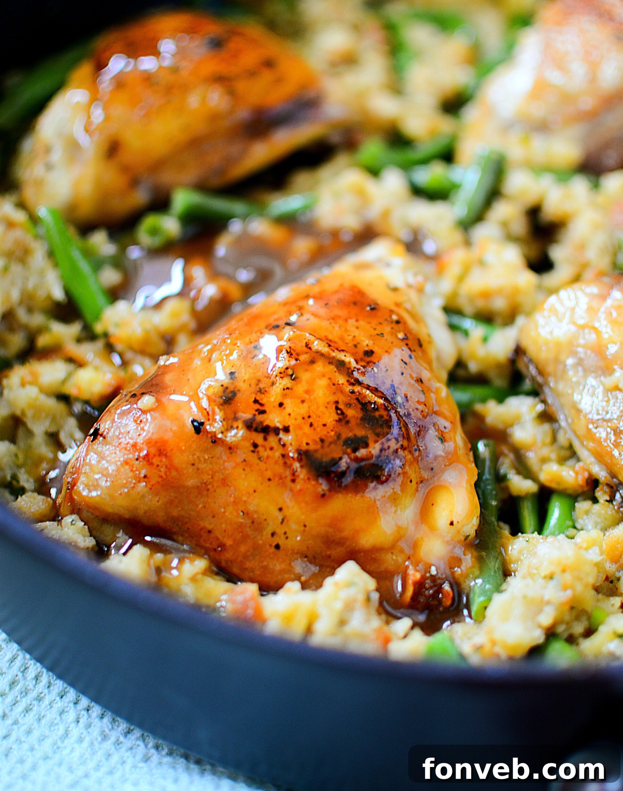 A close-up of a serving of the chicken and stuffing, highlighting the moist texture and appealing presentation