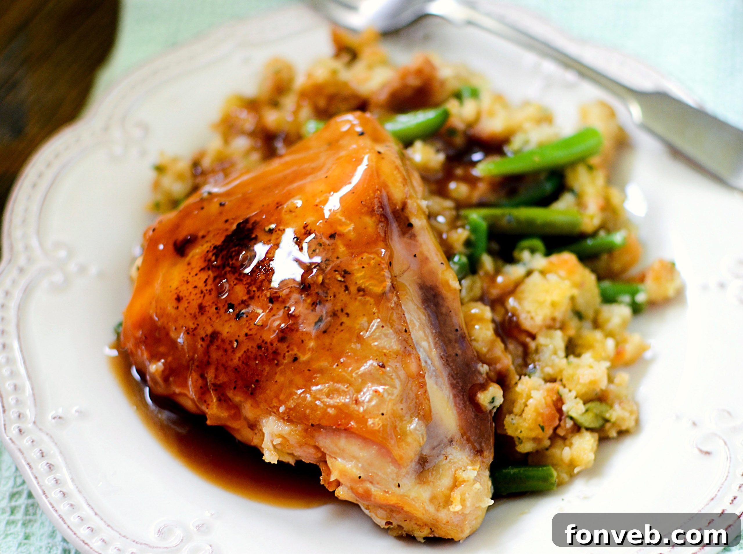 Another tempting view of the gravy-covered chicken and stuffing, emphasizing its appetizing appeal