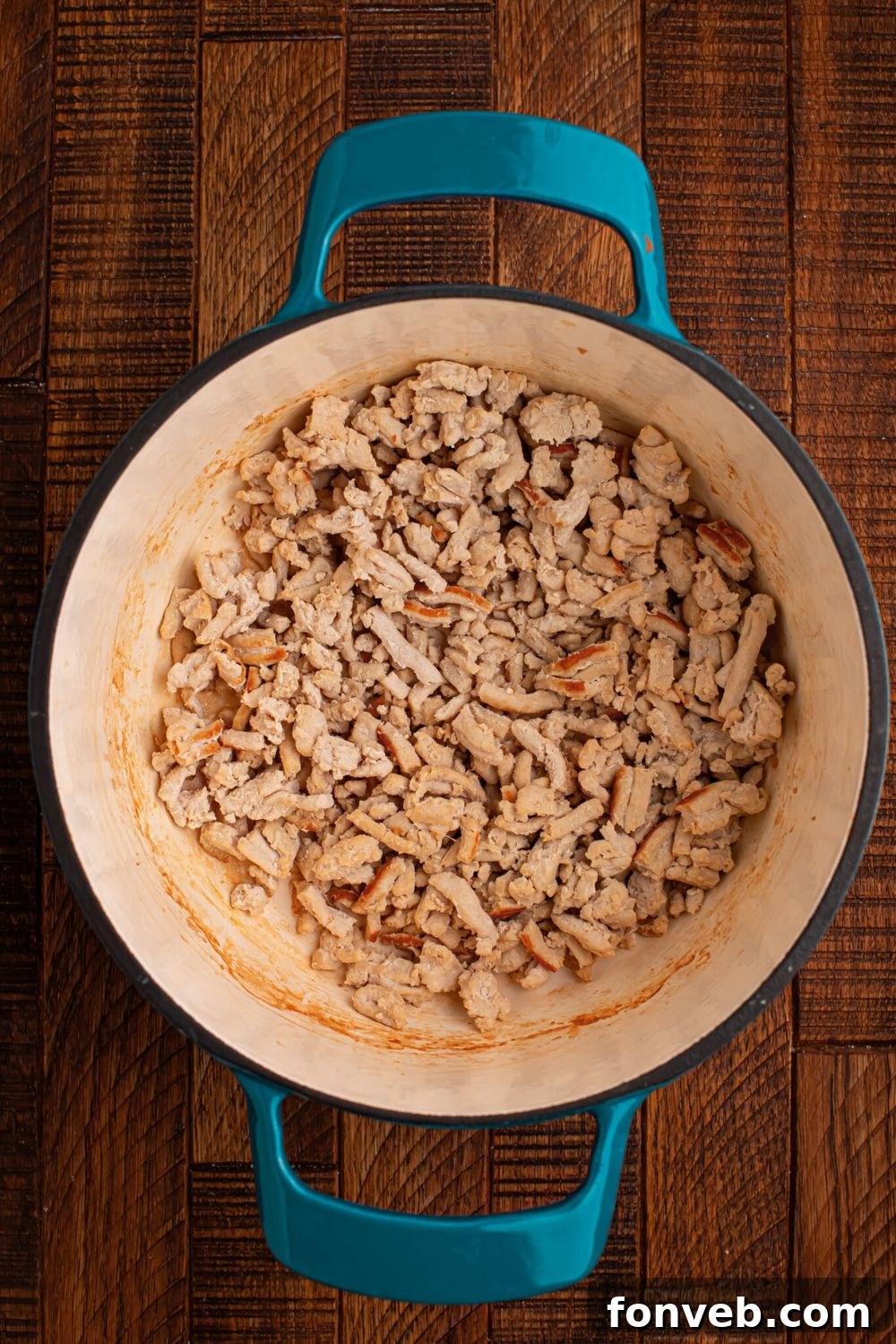 ground chicken in a pot sitting on table