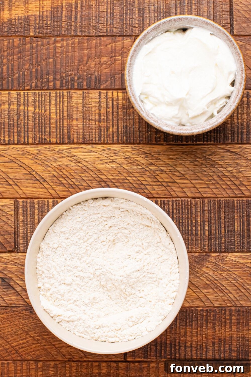 2-Ingredient Buttery Garlic Parmesan Breadsticks 6 ingredients for making 2 Ingredient Garlic Parmesan Breadsticks on table in single serve bowls