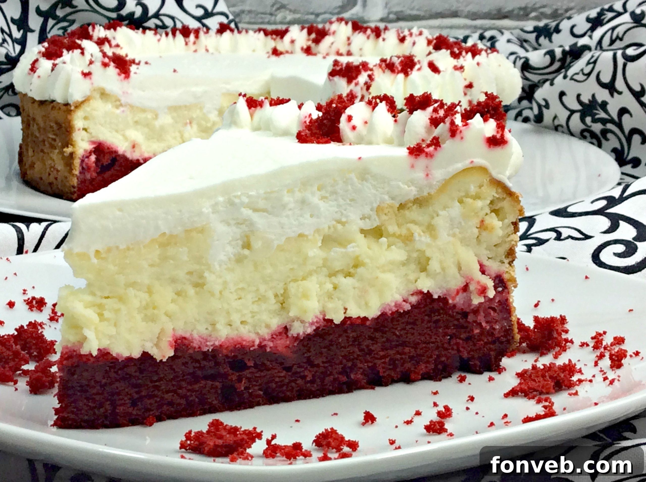 Another close-up shot of the Red Velvet Cheesecake, emphasizing its creamy texture and vibrant color