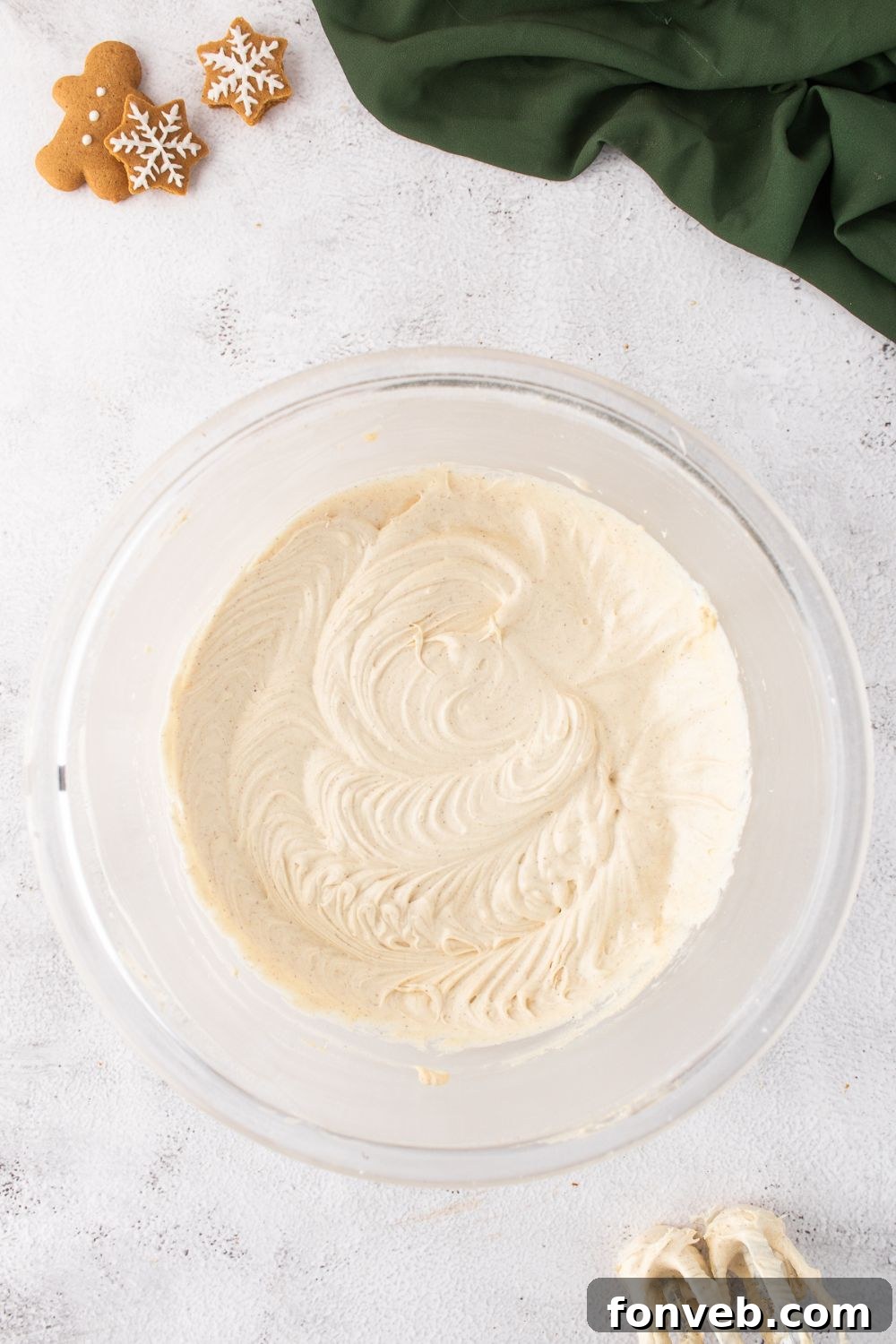 glass bowl of whipped cream cheese frosting
