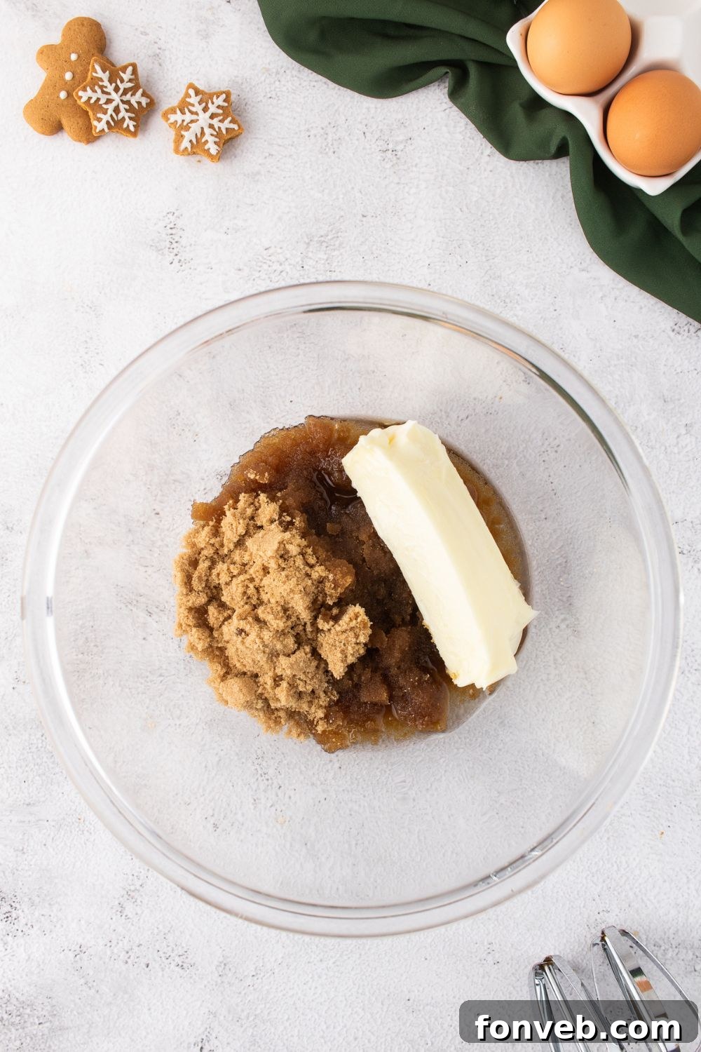 brown sugar and more in a bowl with a stick of butter for making Gingerbread Cake with Cream Cheese Frosting