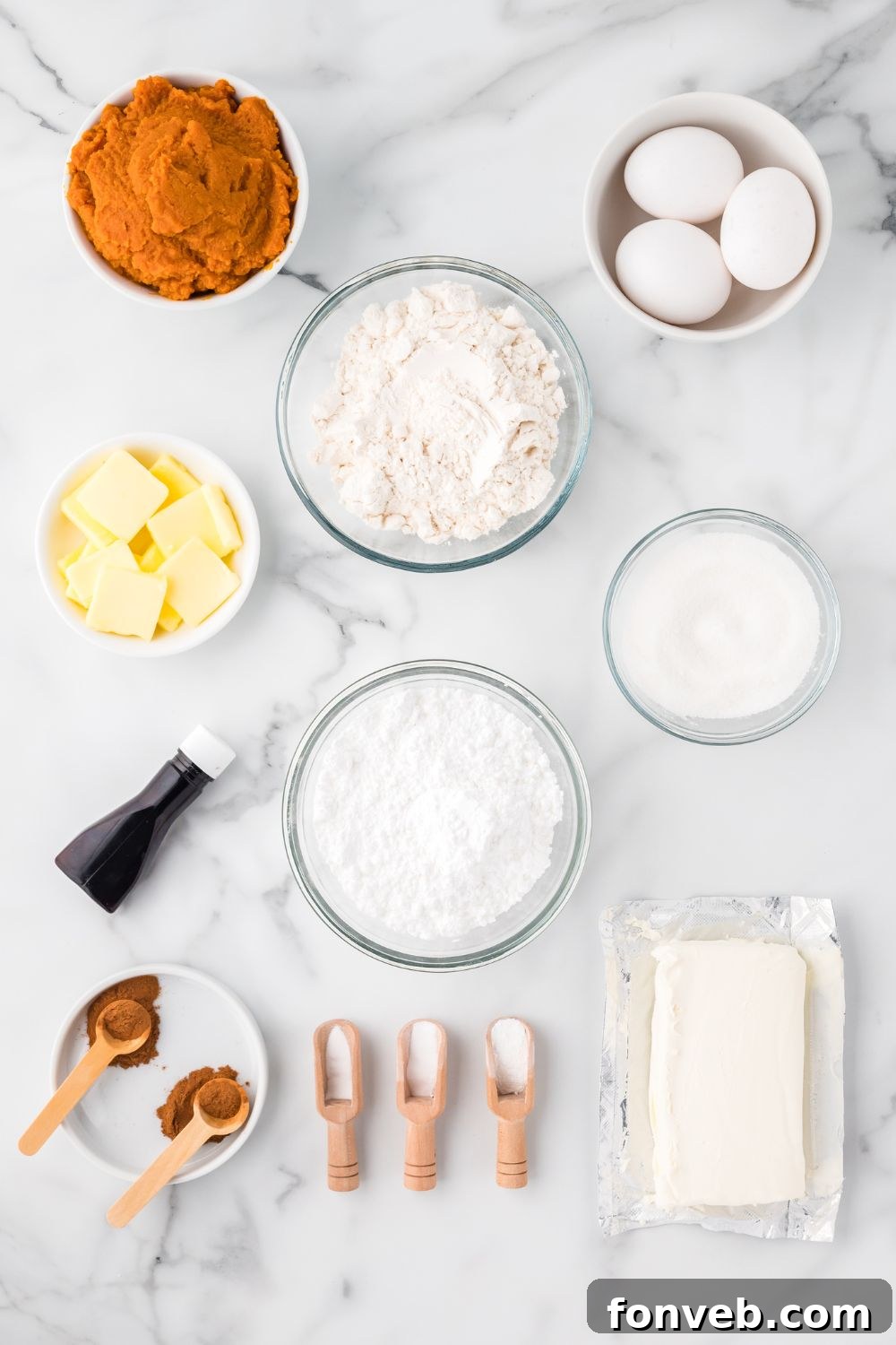 Classic Spiced Pumpkin Roll 6 All the ingredients for Pumpkin Cake Roll in single serve containers on table to show all the ingredients you will need.