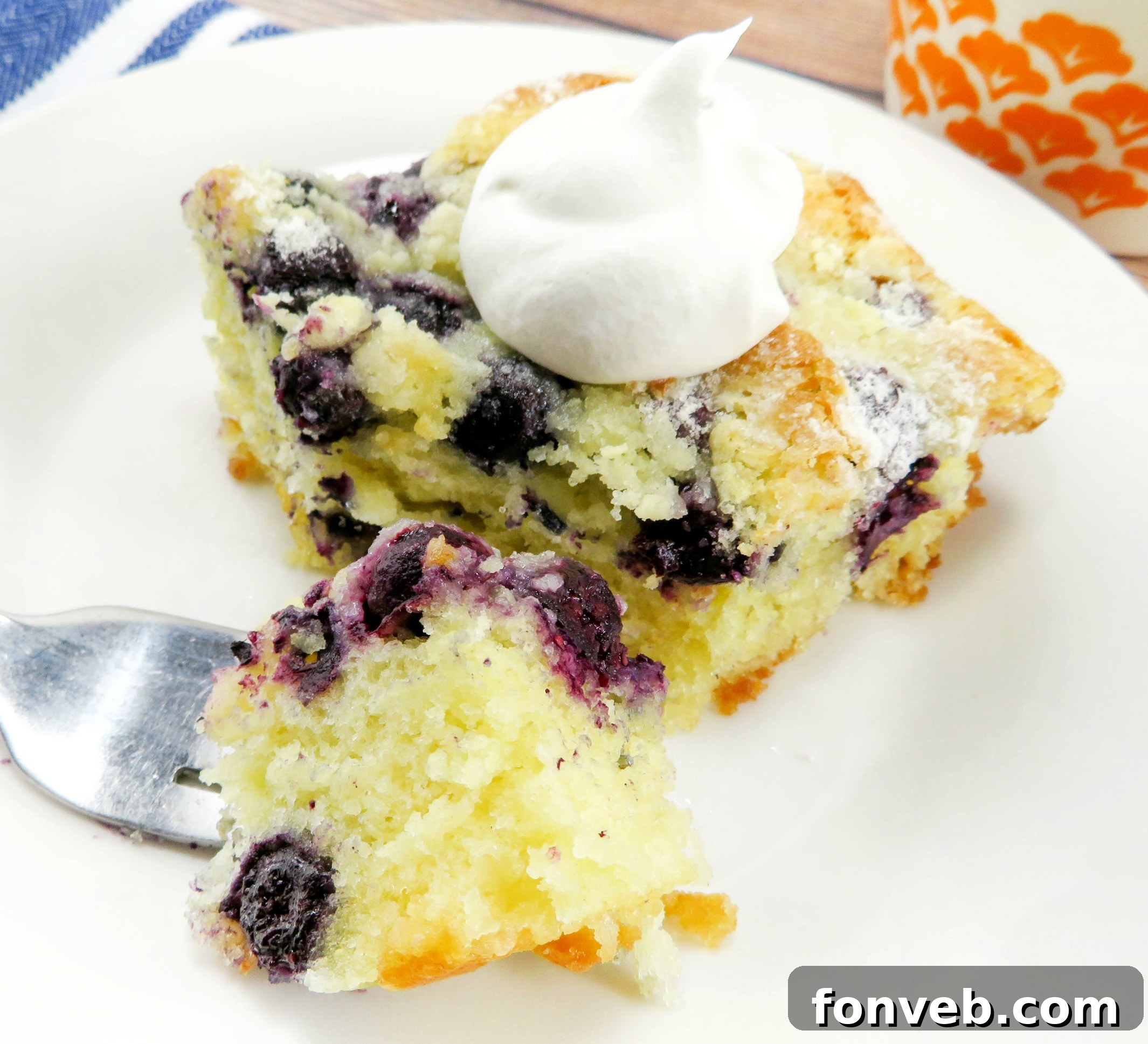 A close-up shot of the blueberry butter cake's moist crumb, emphasizing its delightful texture