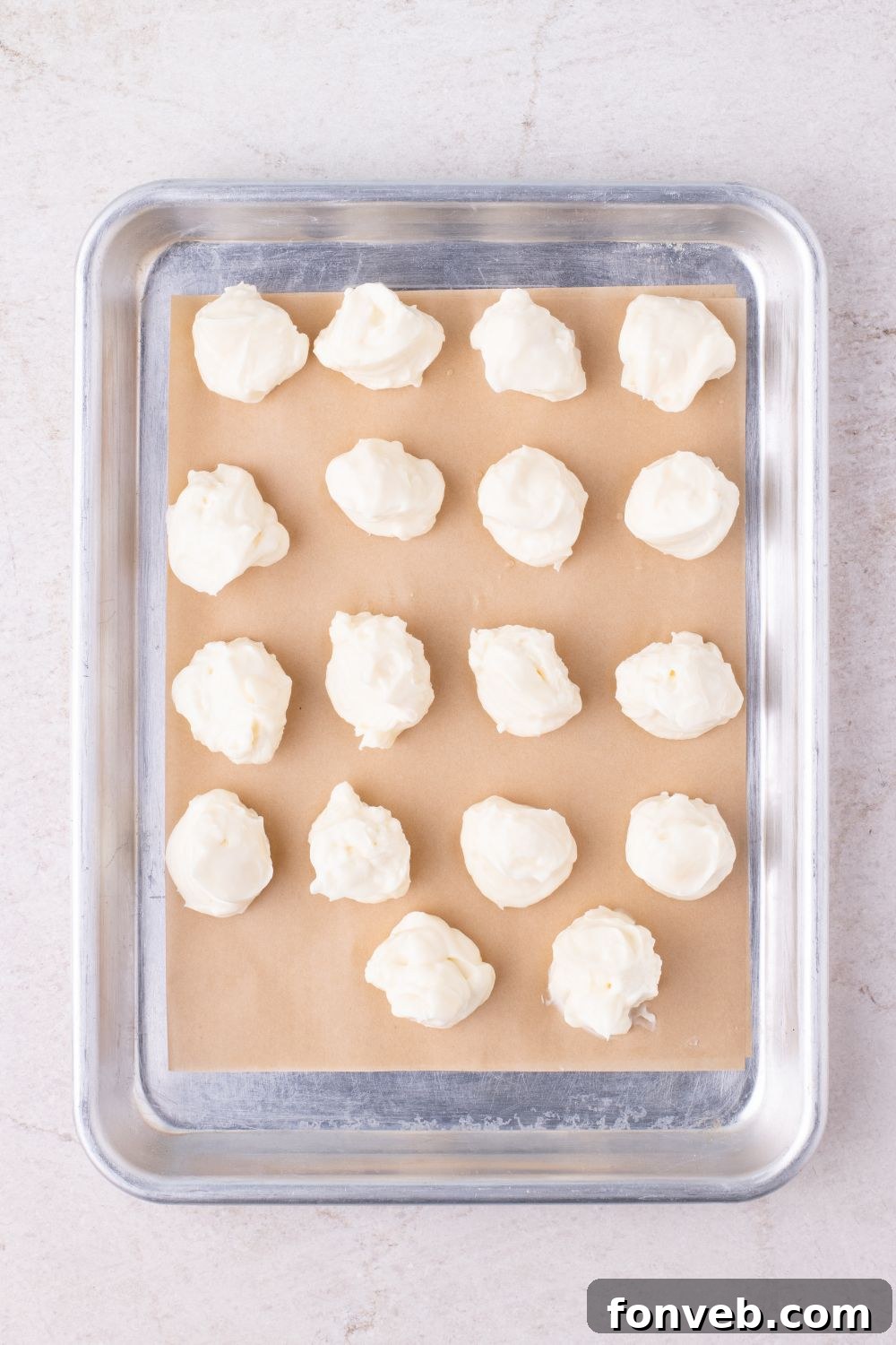 cheesecake batter for cookies on baking tray in balls 
