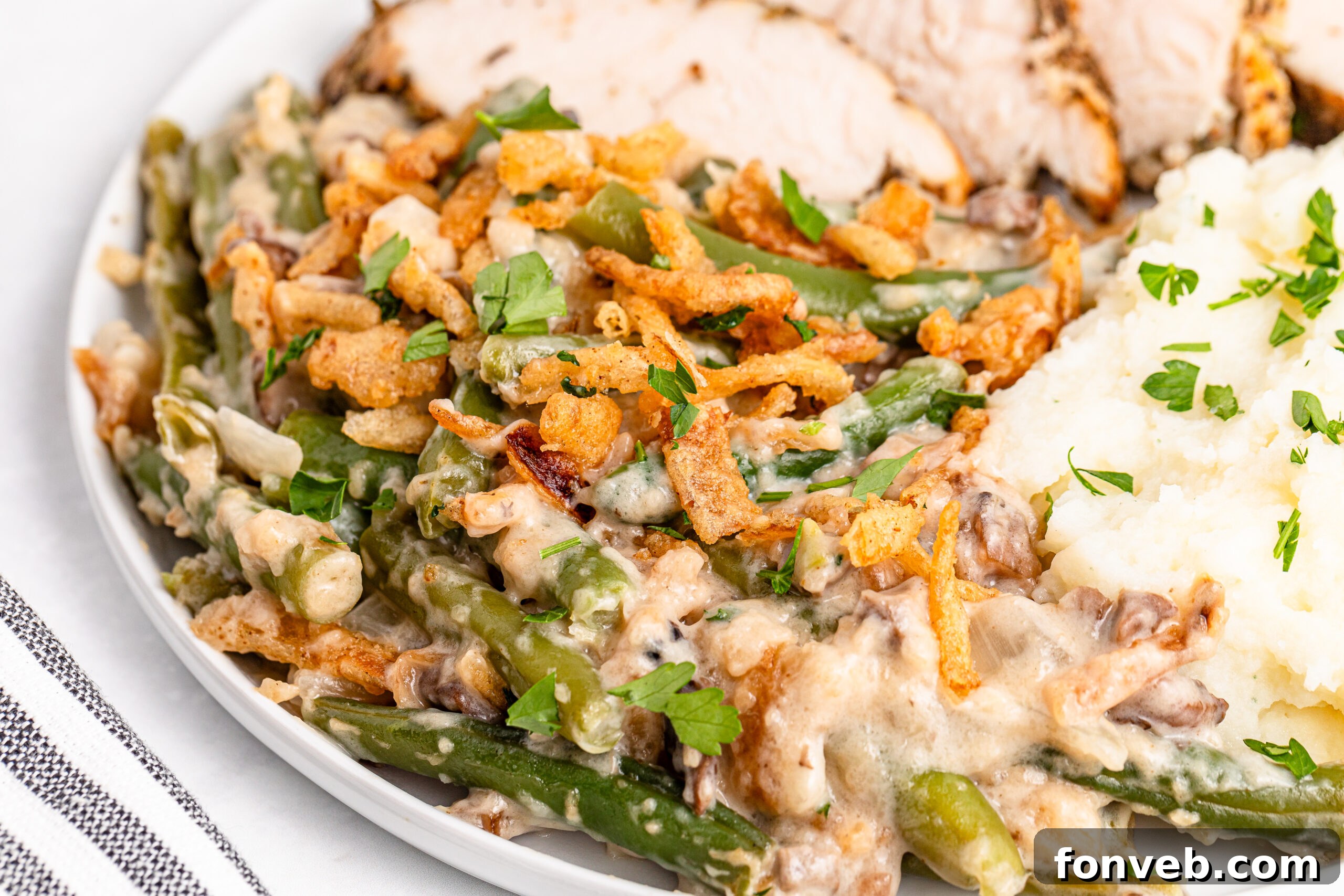 Up close of a plate filled with the Best Ever Green Bean Casserole