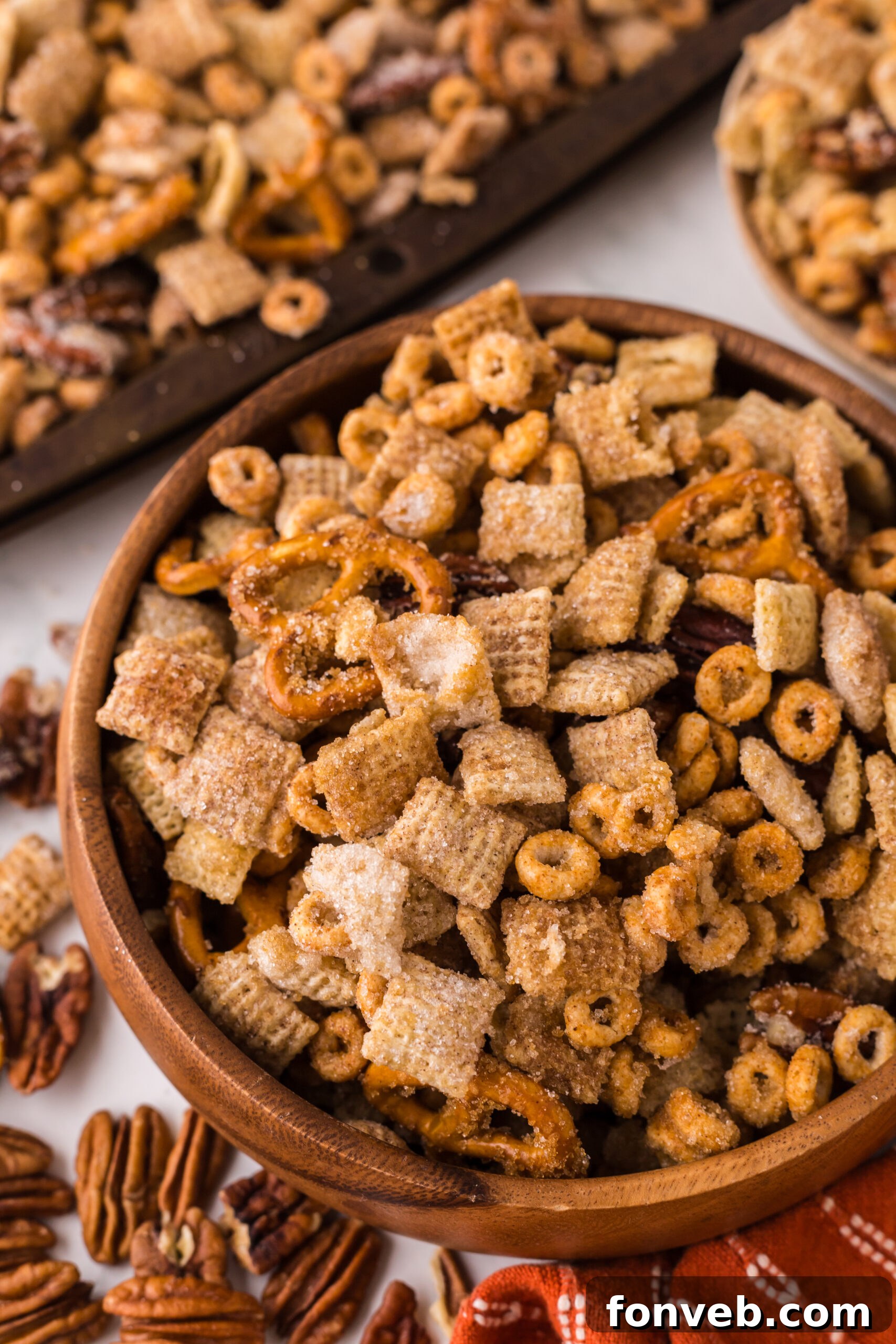 Pumpkin Spice Chex Mix in a wooden bowl 