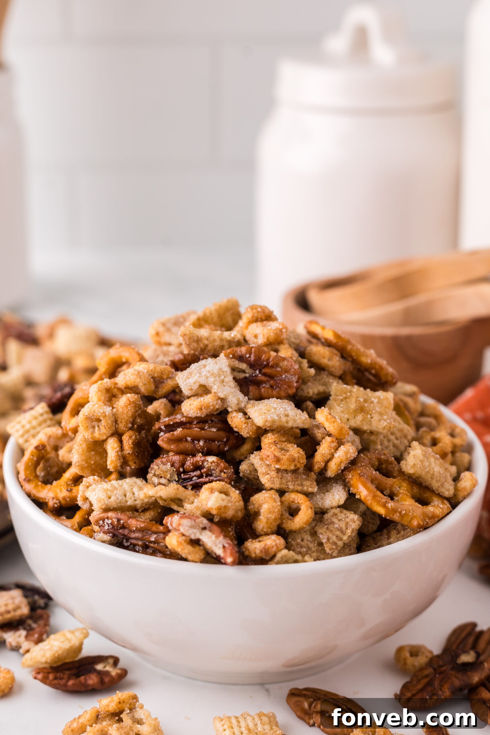 Pumpkin Spice Chex Mix in a white serving bowl 