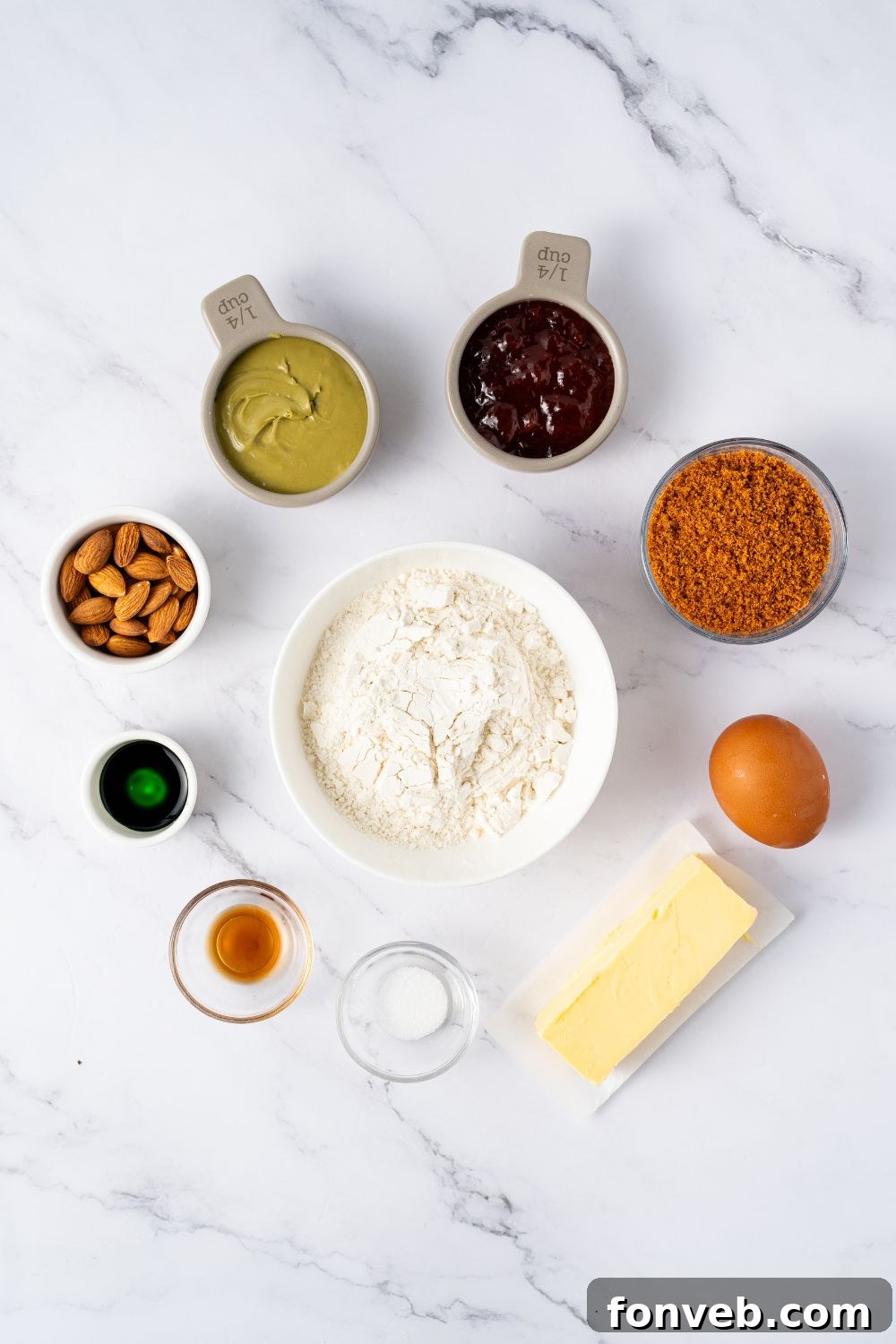 Witch Finger Cookies A Ghoulishly Fun Halloween Bake 5 ingredietns for Witch Finger Cookies in single serve containers on a marble counter