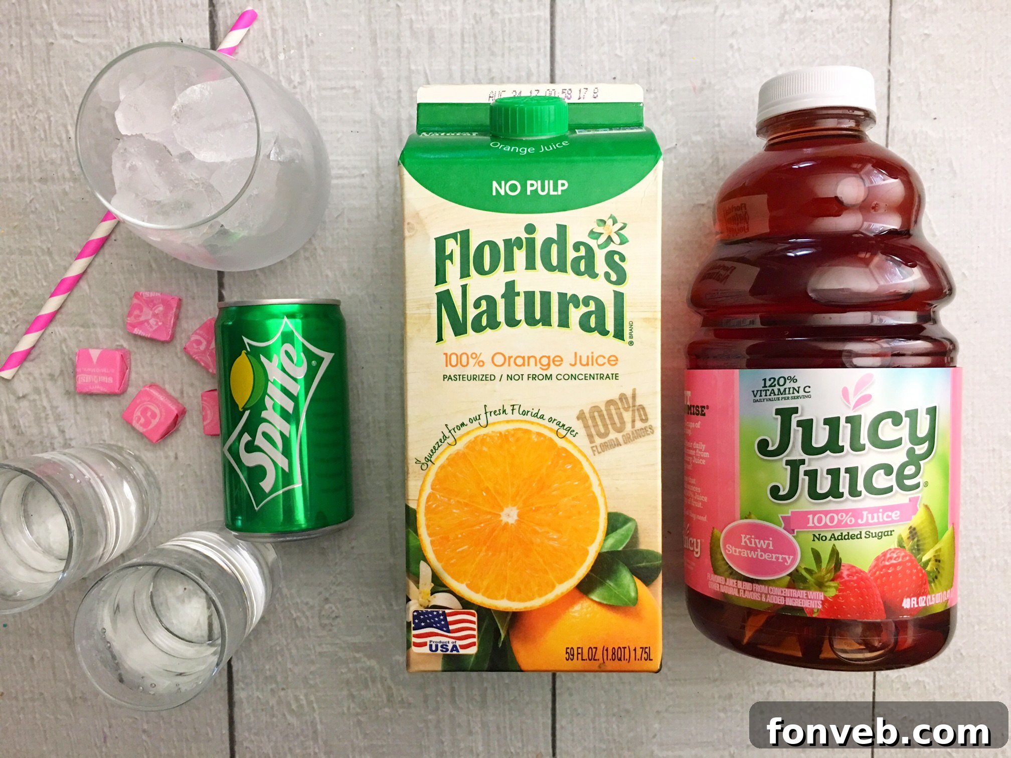 Candy Pink Burst Cocktail 3 Close-up of the Pink Starburst Cocktail with ice and pink Starburst candies floating, vibrant and inviting.