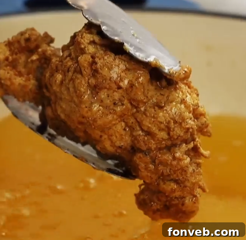 Assortment of homemade fried chicken pieces on a serving platter