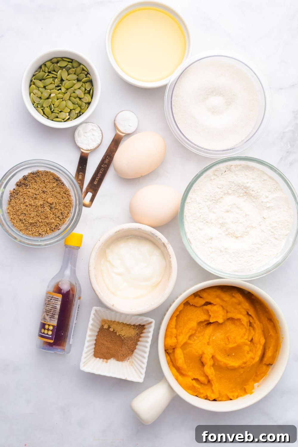 all the ingredients for Starbucks Pumpkin Bread in single serve containers on a white table 