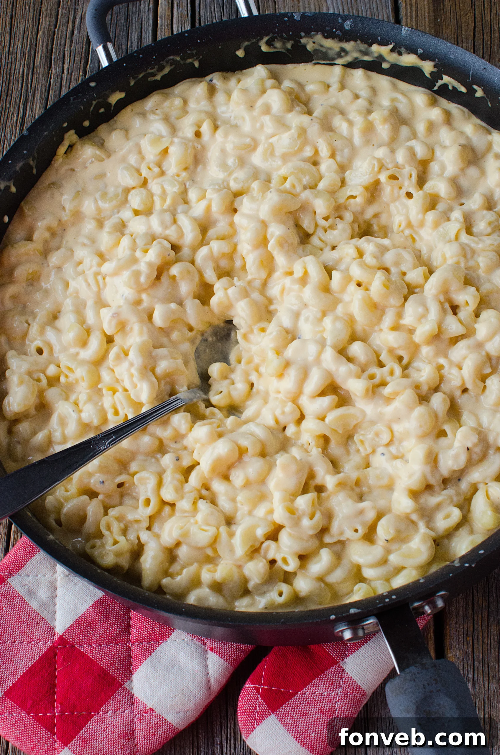 Another enticing view of the baked macaroni and cheese, showcasing its golden crust