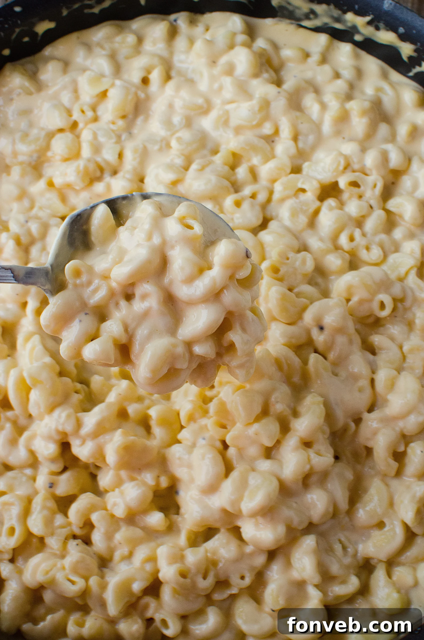 A serving of the macaroni and cheese, revealing its rich layers