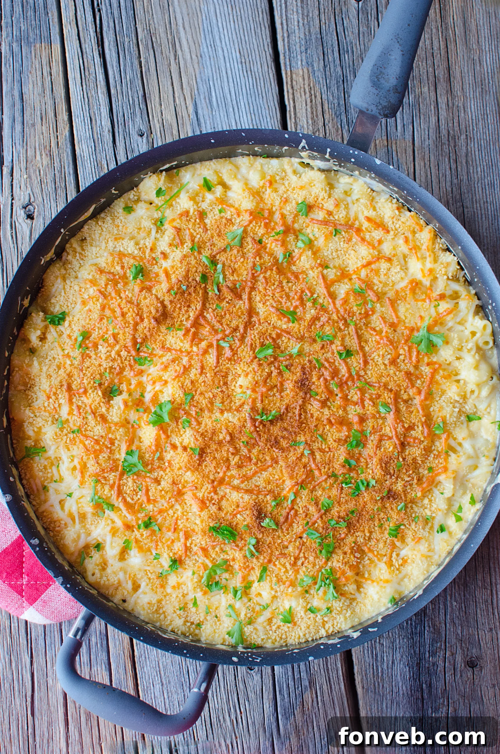 A large baking dish filled with the creamy macaroni and cheese before baking