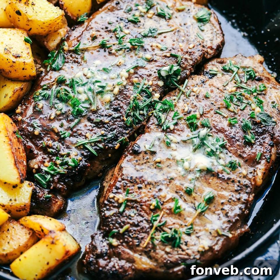 Skillet Garlic Butter Herb Steak and Potatoes in a cast iron skillet