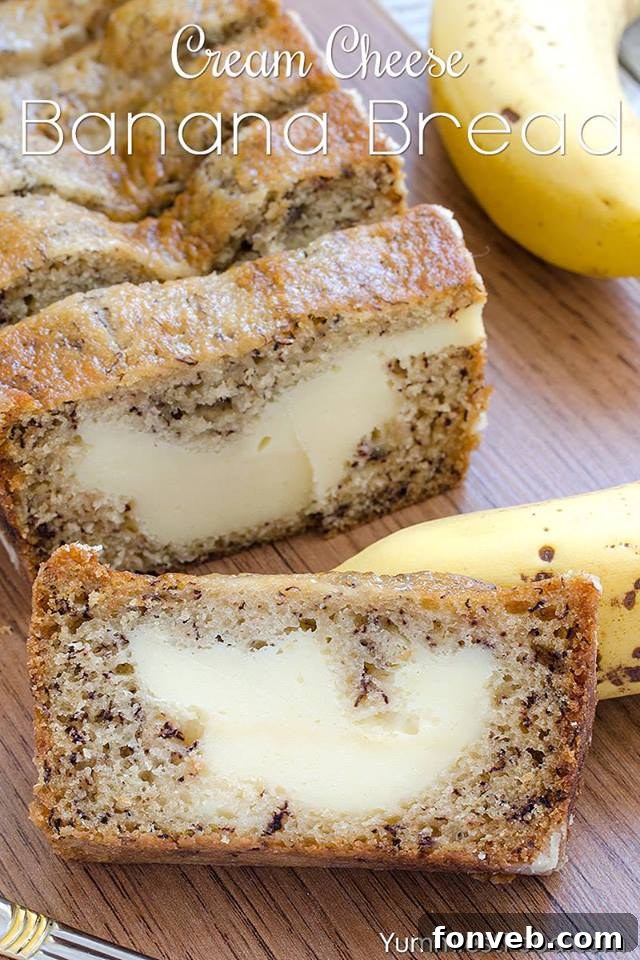 Cream Cheese Banana Bread sliced on a cutting board