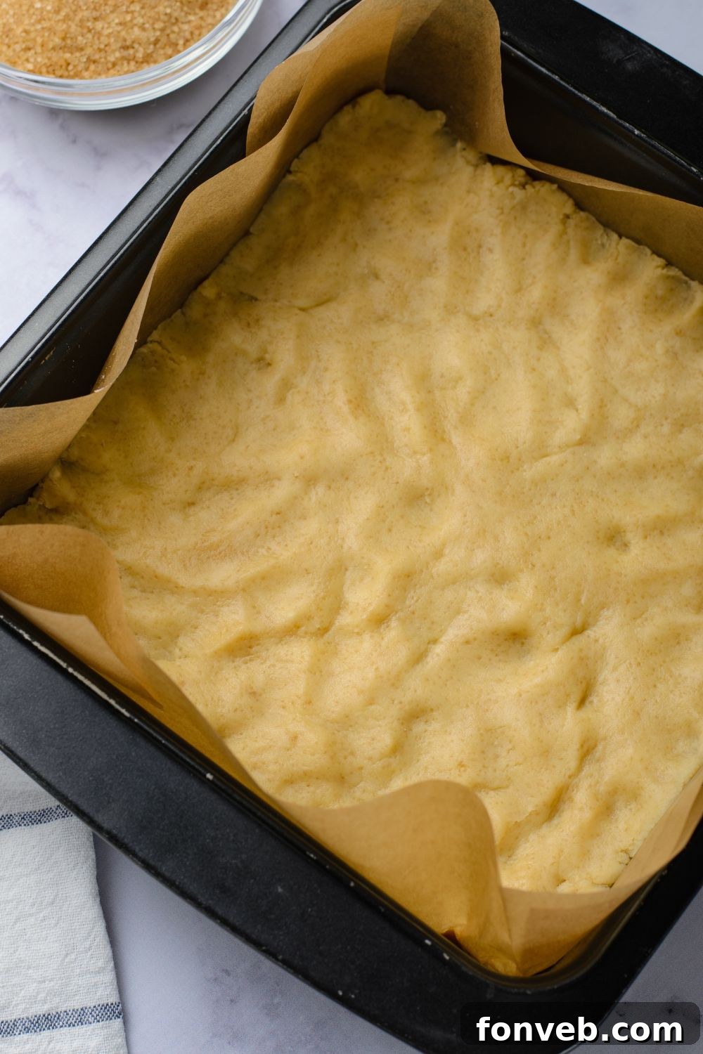 buttery crust pressed into a baking pan