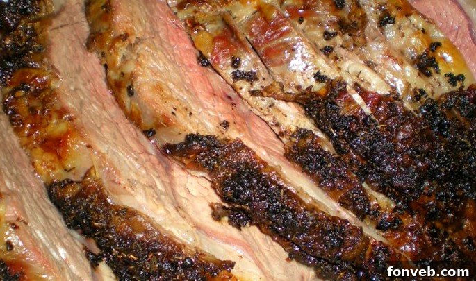 Garlic and herb seasoning generously applied to a prime rib