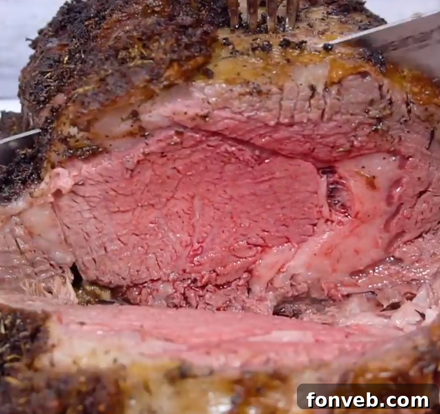 Close-up of a prime rib roast, highlighting the fat marbling