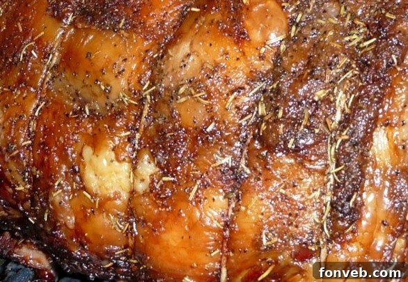 Meat thermometer inserted into a prime rib roast