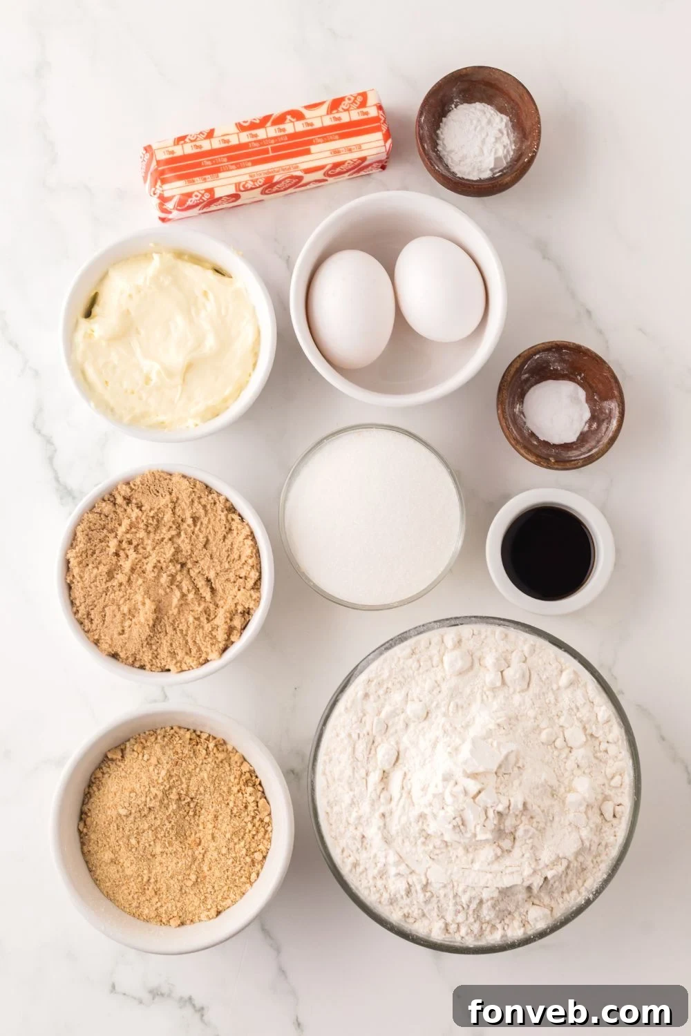 ingredients for Cheesecake stuffed cookies on table in single serve containers