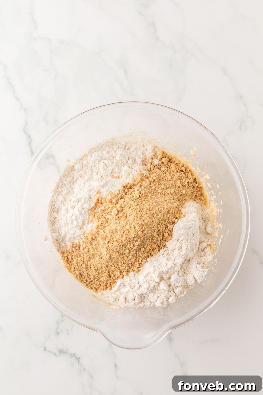 dry ingredients in a glass bowl for making cheesecake cookies