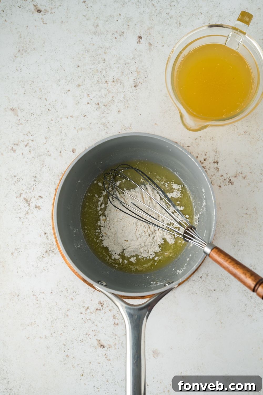 Flour mixture in a saucepan on table
