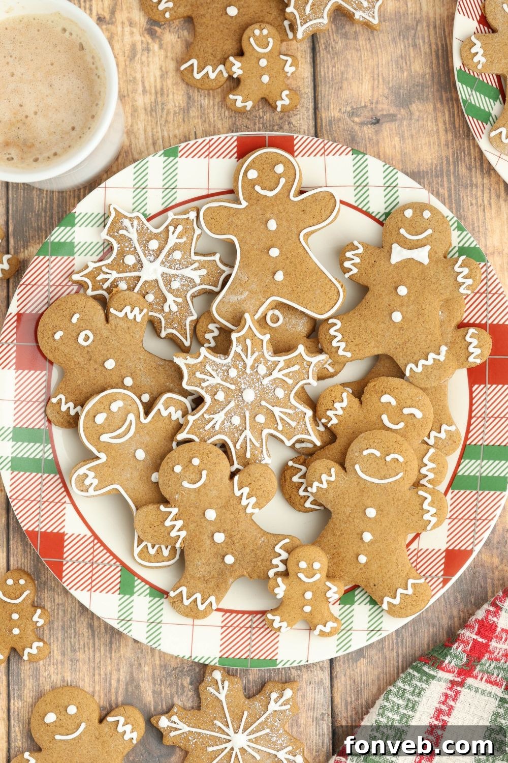 Dazzling Christmas Gingerbread Adorned With Royal Icing 15 colorful plate full of Christmas gingerbread cookies all over and different shapes