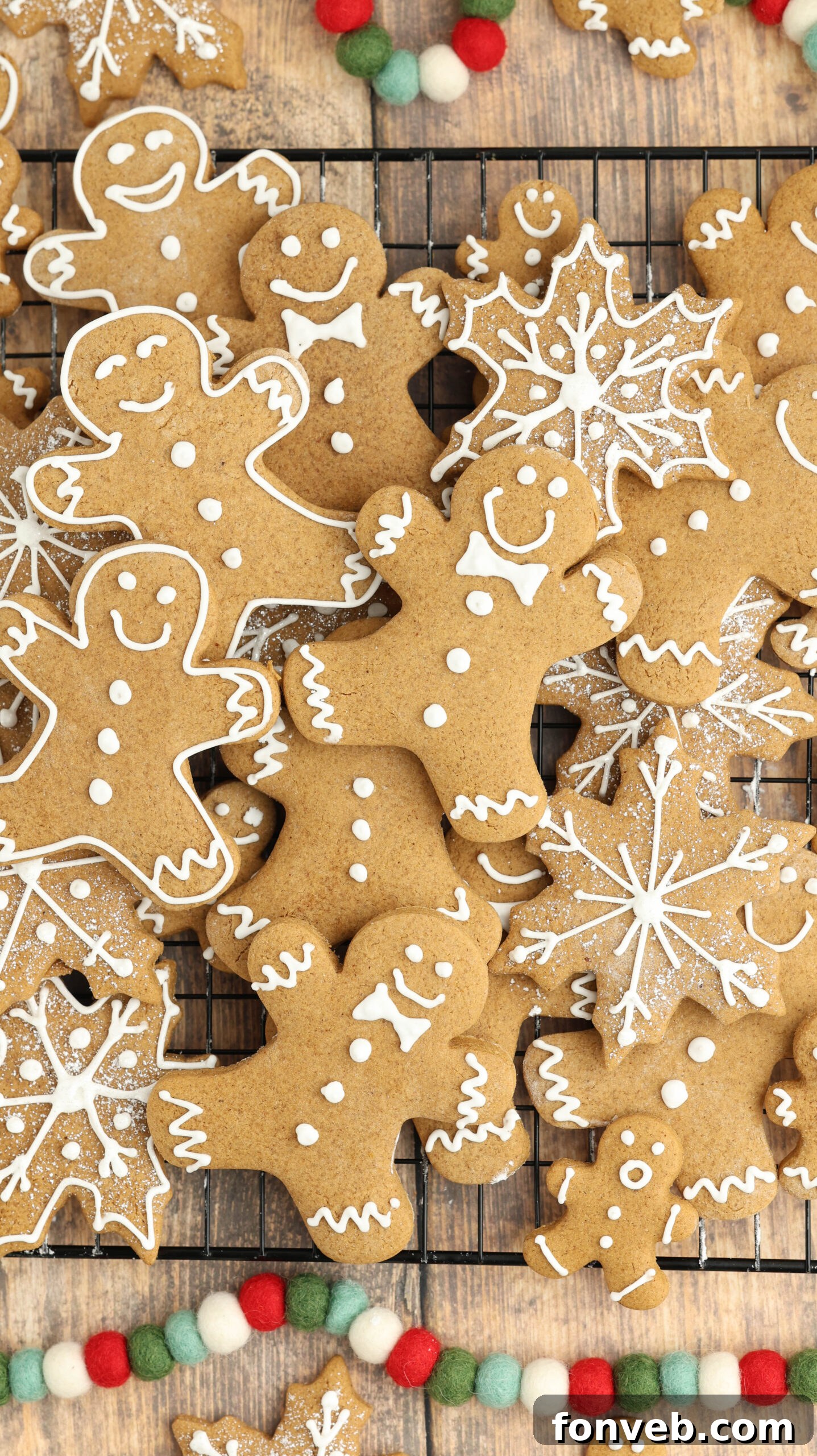 Dazzling Christmas Gingerbread Adorned With Royal Icing 16 cooling rack with Christmas gingerbread cookies all over and different shapes