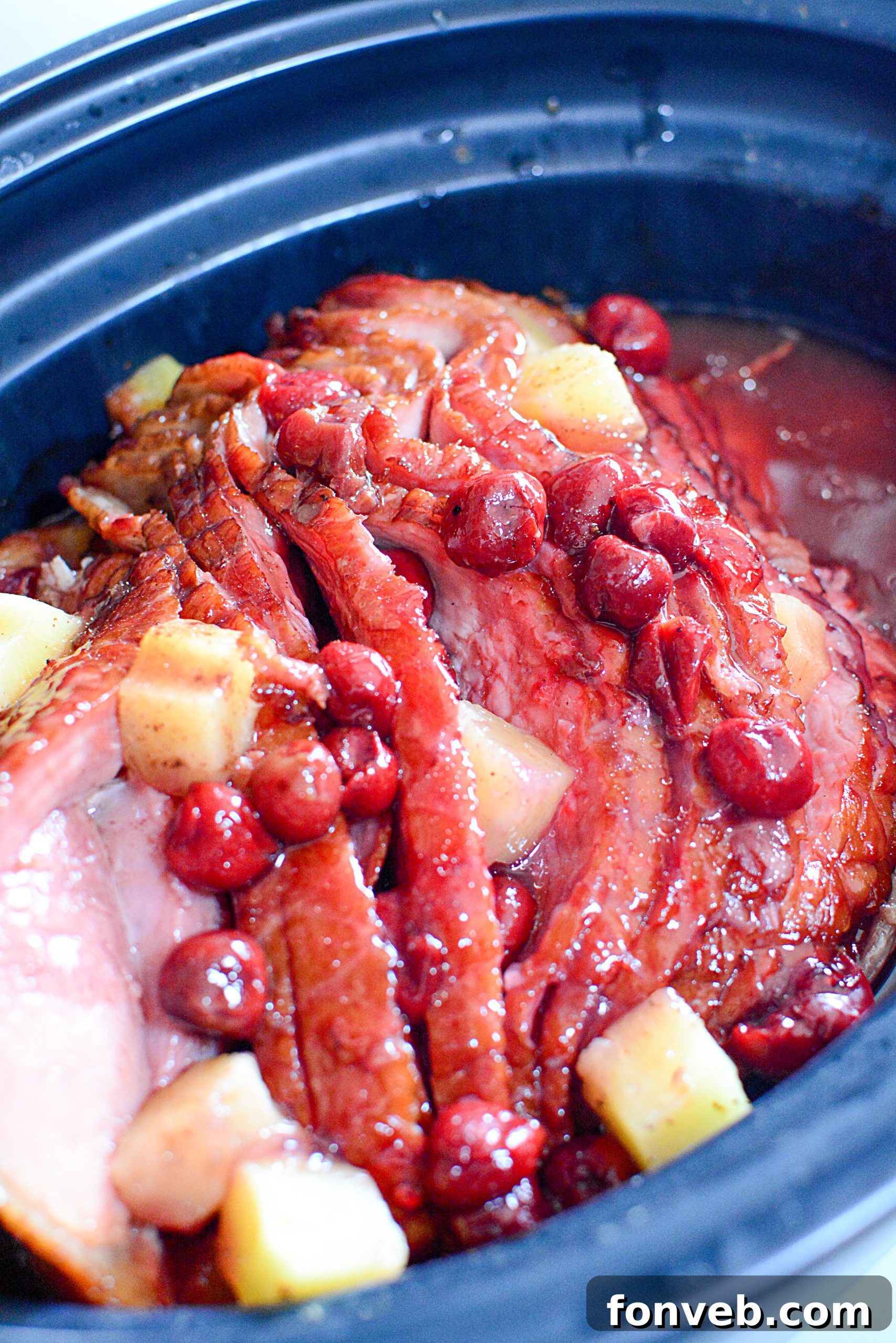 Slow Cooker Caramelized Pineapple Ham 6 Platter of slow cooker pineapple ham, showcasing its tender texture and delicious glaze.