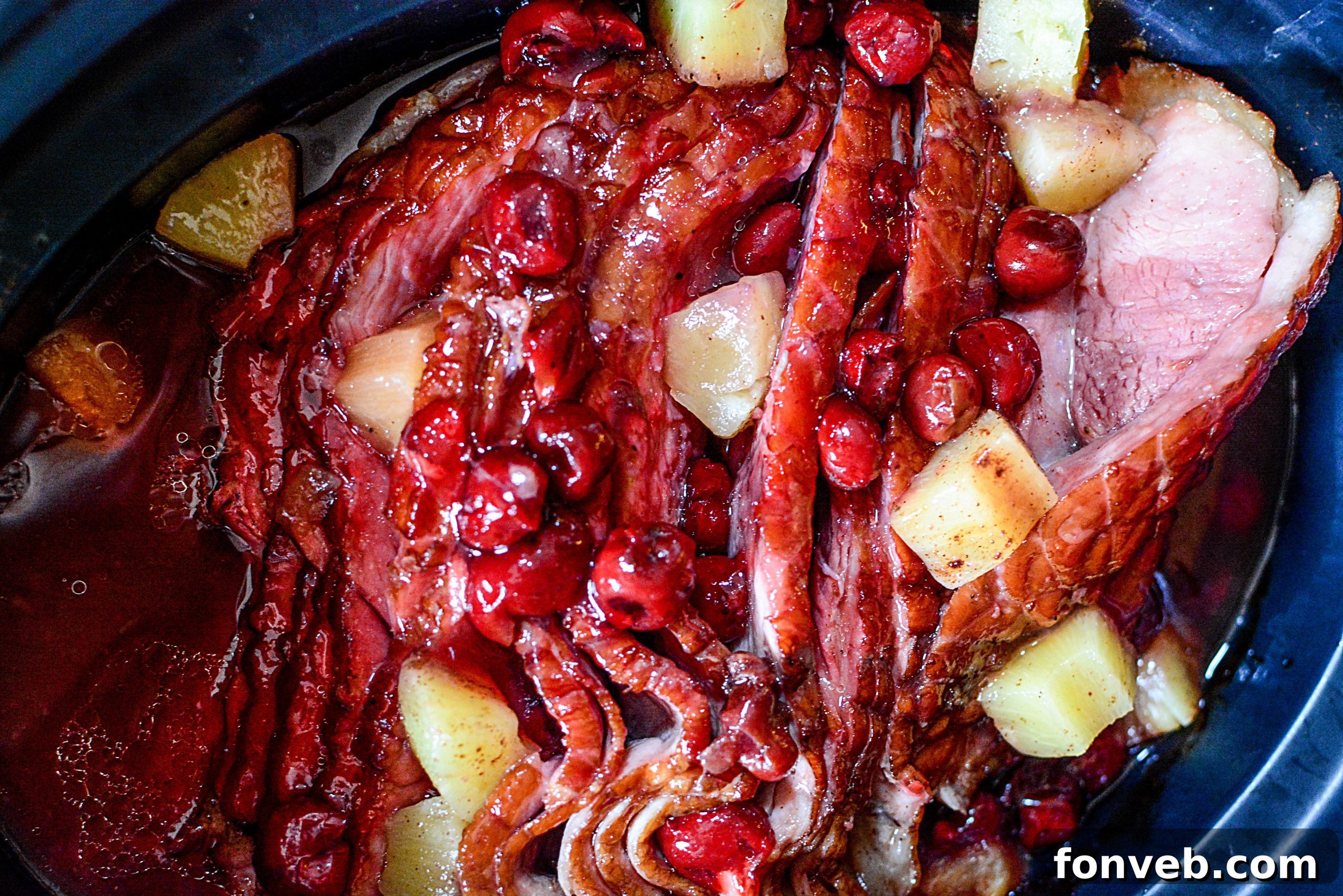 Slow Cooker Caramelized Pineapple Ham 10 A perfectly prepared pineapple ham, ready to be served, showcasing its golden glaze.