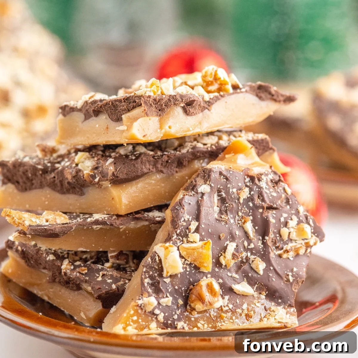 English Toffee on a plate with more behind it on table 