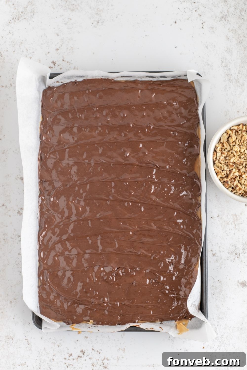 chocolate spread over the top of toffee 