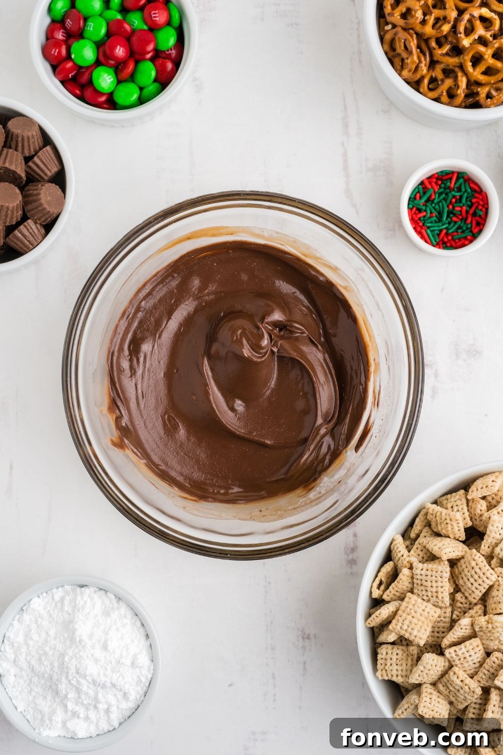 melted peanut butter mixture ina glass bowl on table