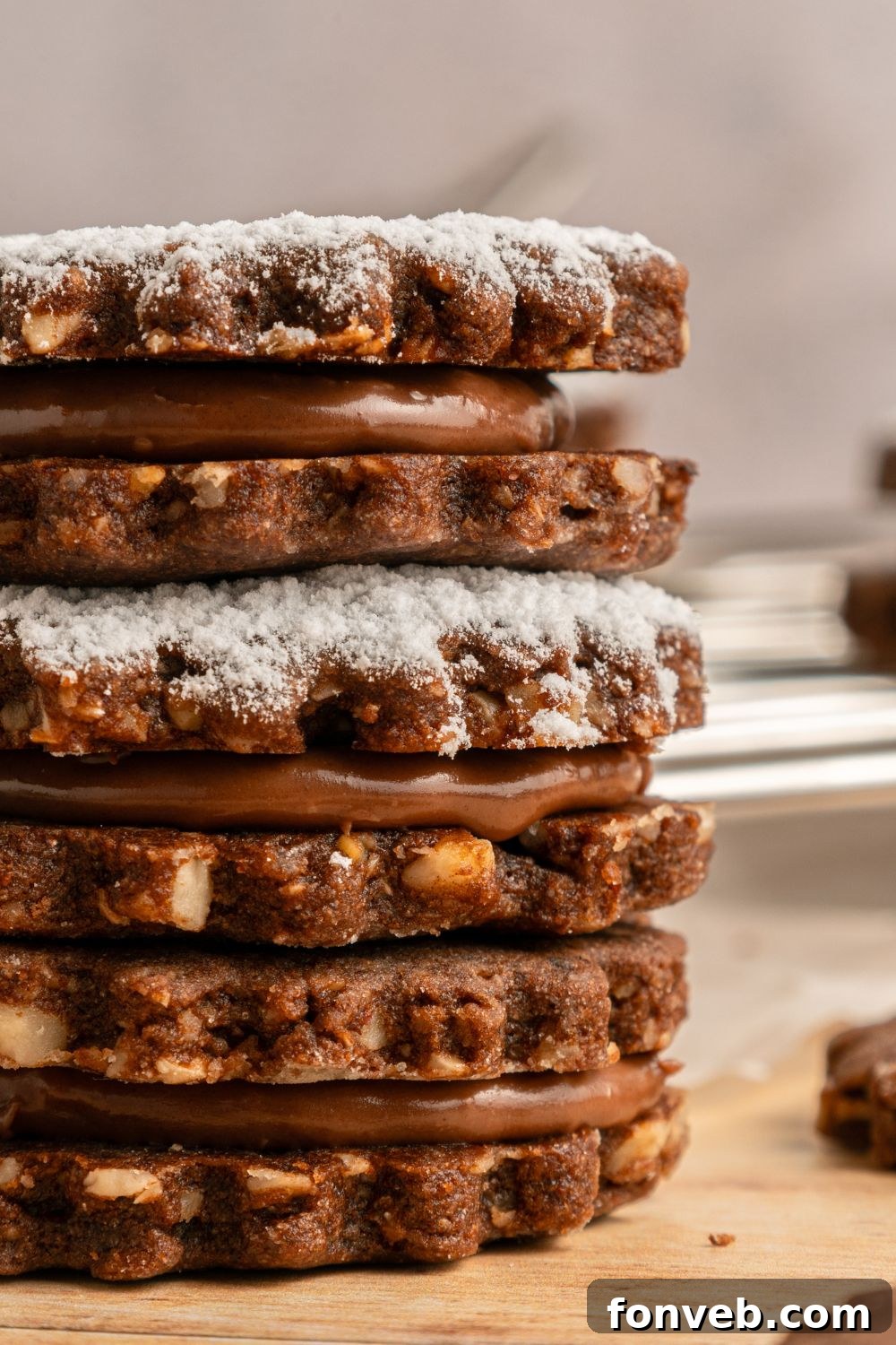 stalk of Chocolate Linzer Cookies on the table 