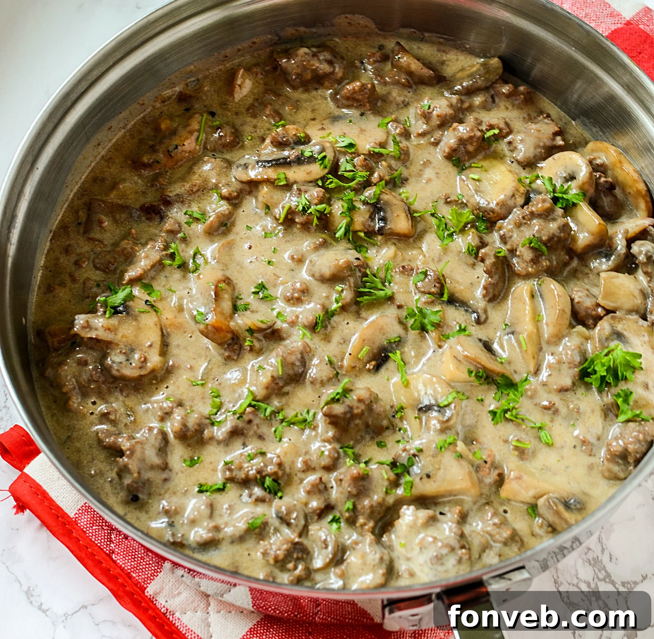 Delicious One-Skillet Ground Beef Stroganoff cooking in a pan