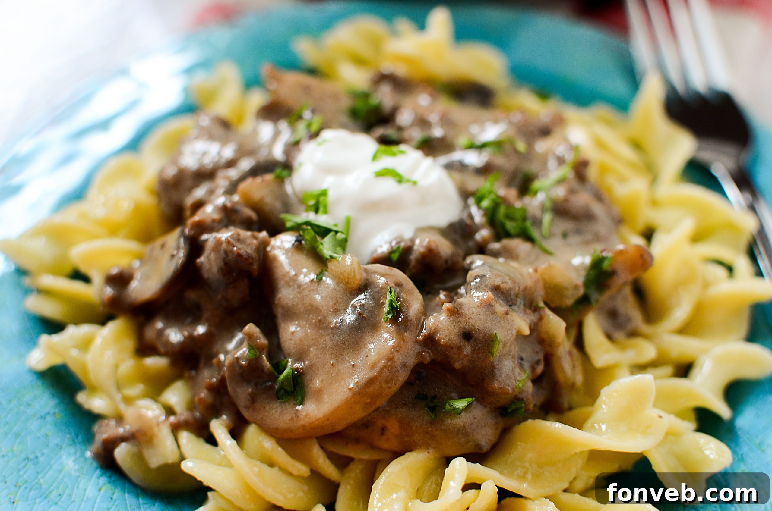 A serving of low-carb Ground Beef Stroganoff with sour cream