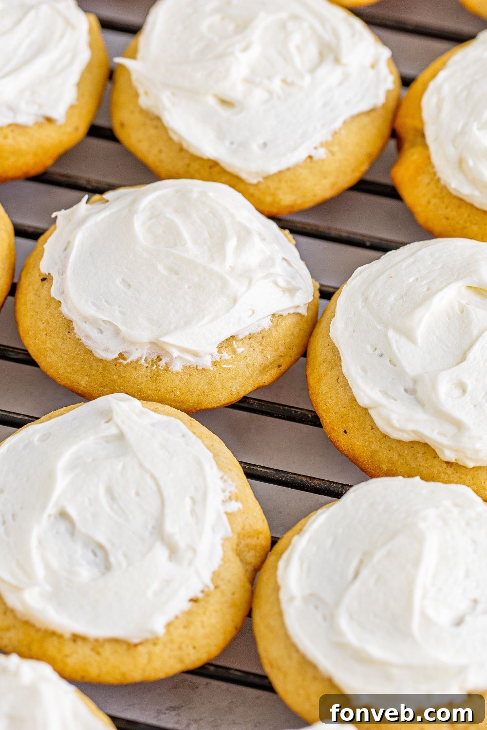 Soft Frosted Eggnog Cookies on a cooling rack