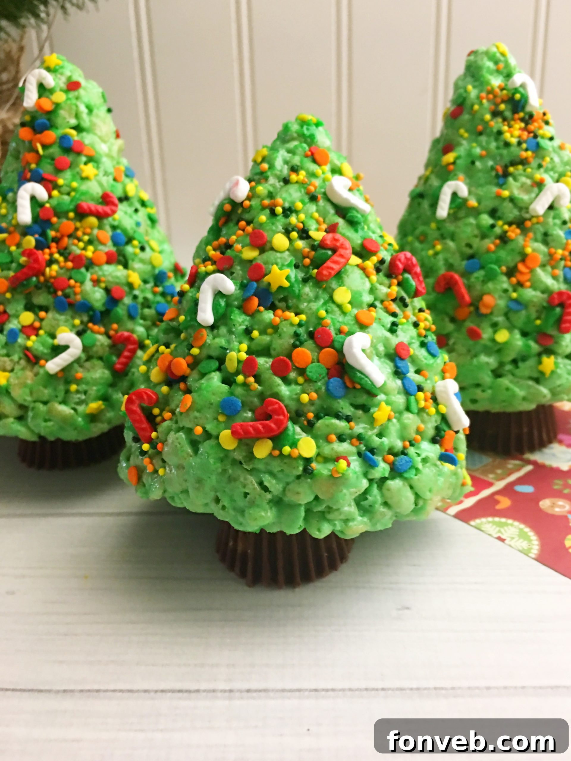 Beautifully decorated green Christmas Tree Rice Krispie treat with sprinkles