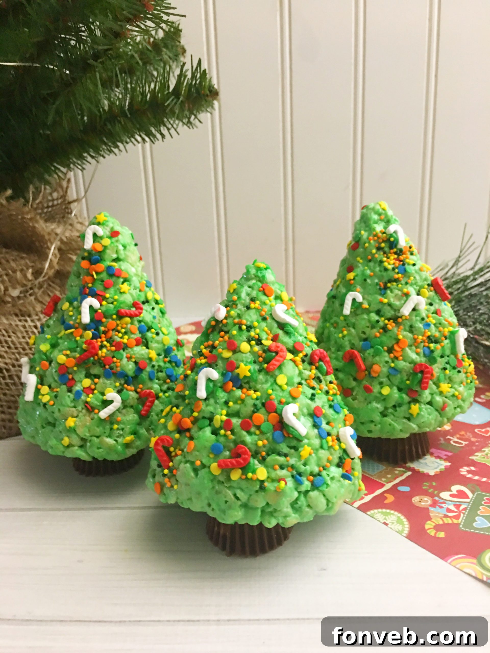 A collection of festive Christmas Tree Rice Krispie treats on a platter