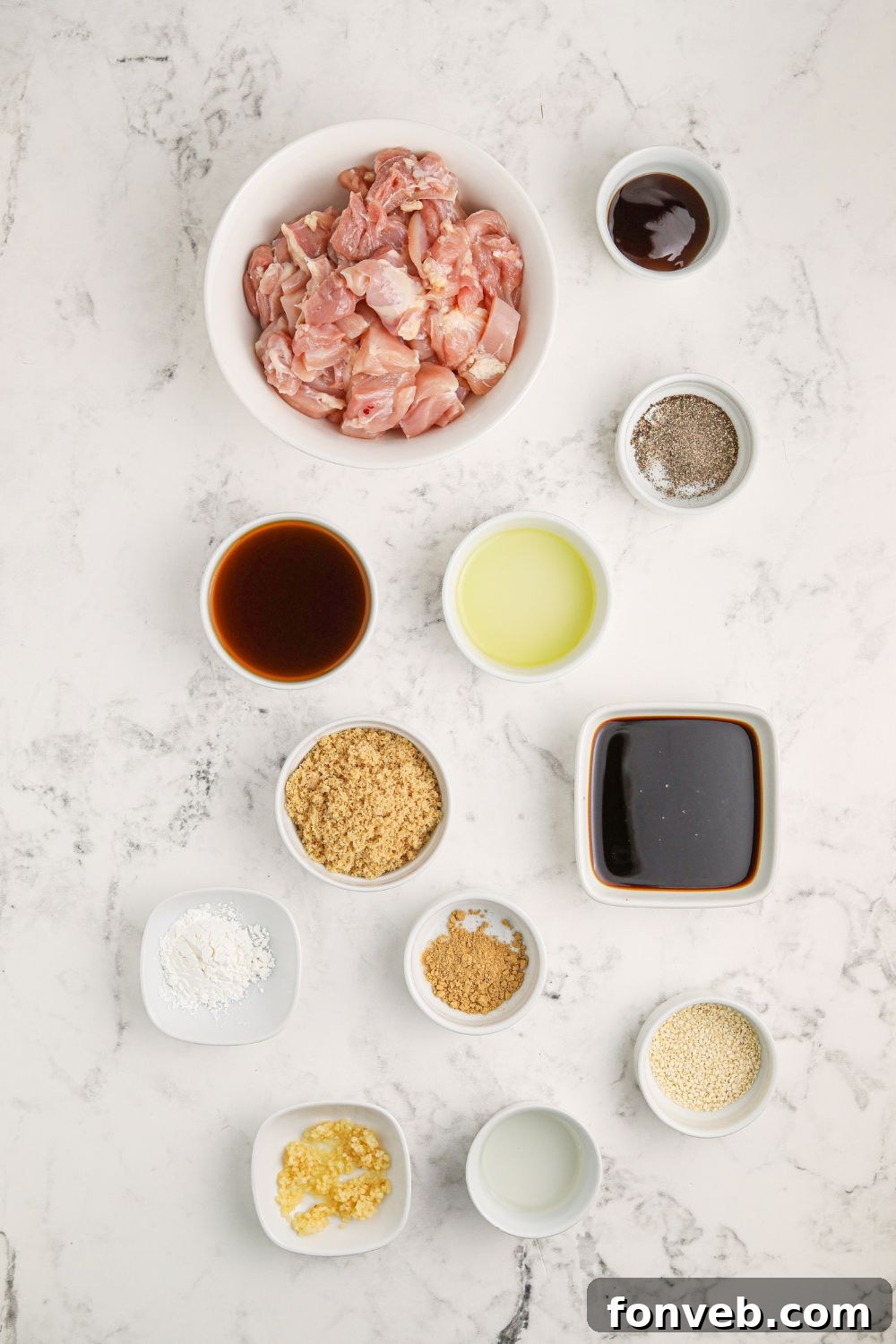 Irresistible Bourbon Chicken Skillet Quick Weeknight Win 6 all the ingredients in small single serve bowls on table for making Bourbon Chicken Skillet