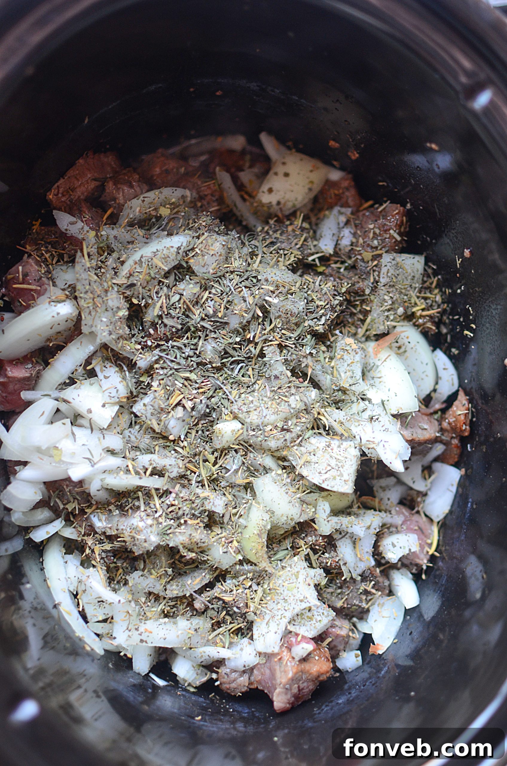 Melt-in-Your-Mouth Slow Cooker Sirloin Beef Tips Smothered in Rich Mushroom Gravy 3 Serving of Slow Cooker Sirloin Beef Tips in Mushroom Gravy, showing the rich texture.