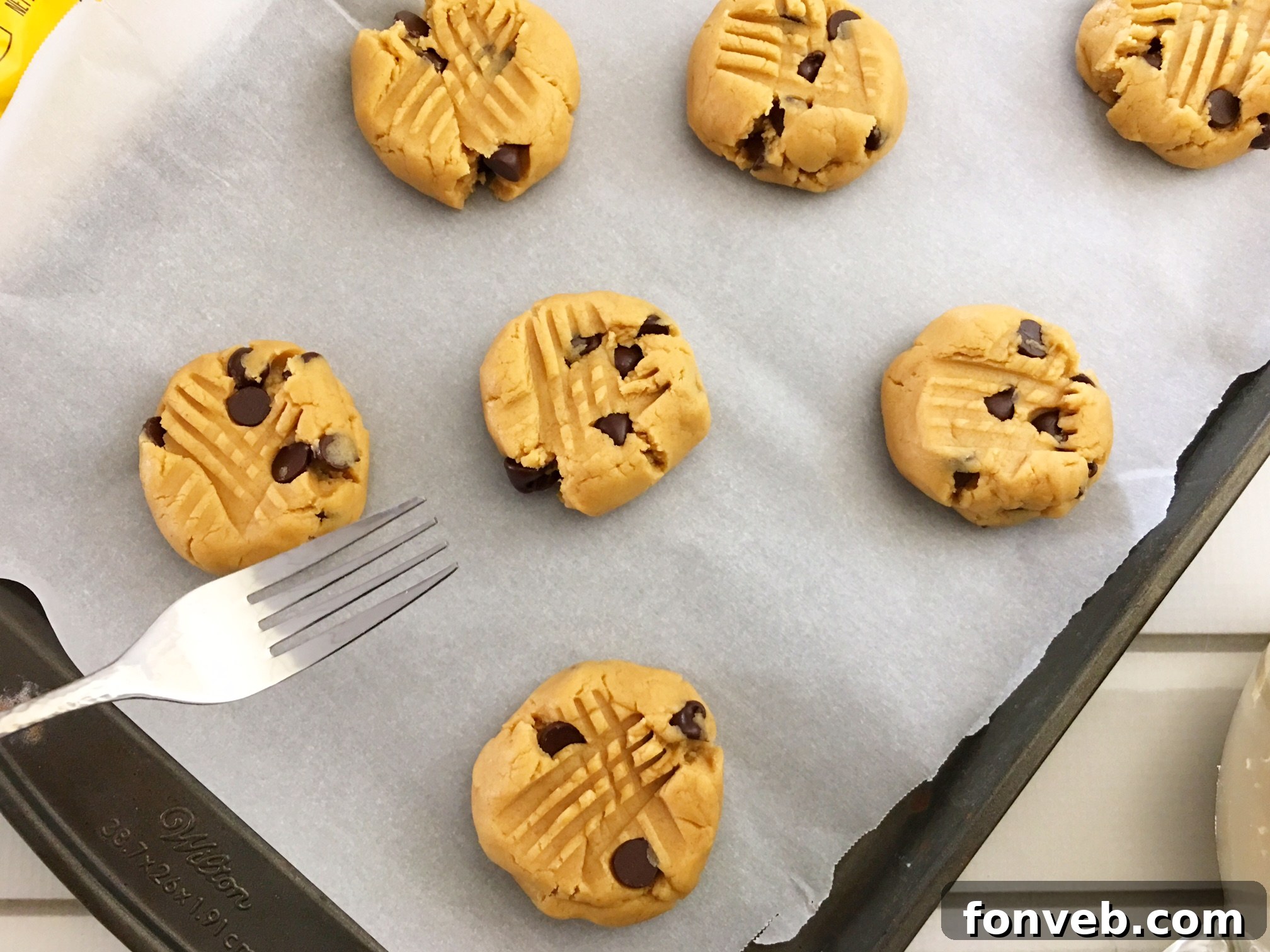 Toll House Velvety Soft Peanut Butter Cookies 4 A stack of homemade peanut butter cookies, inviting a taste.