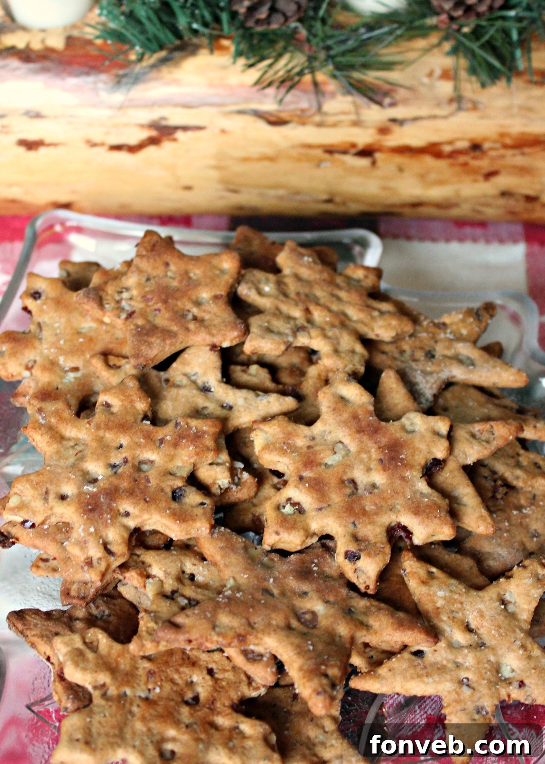 Gourmet Bacon Pecan Crisps 2 Crispy Bacon Pecan Crackers arranged beautifully, showcasing their golden-brown color and irregular shapes.