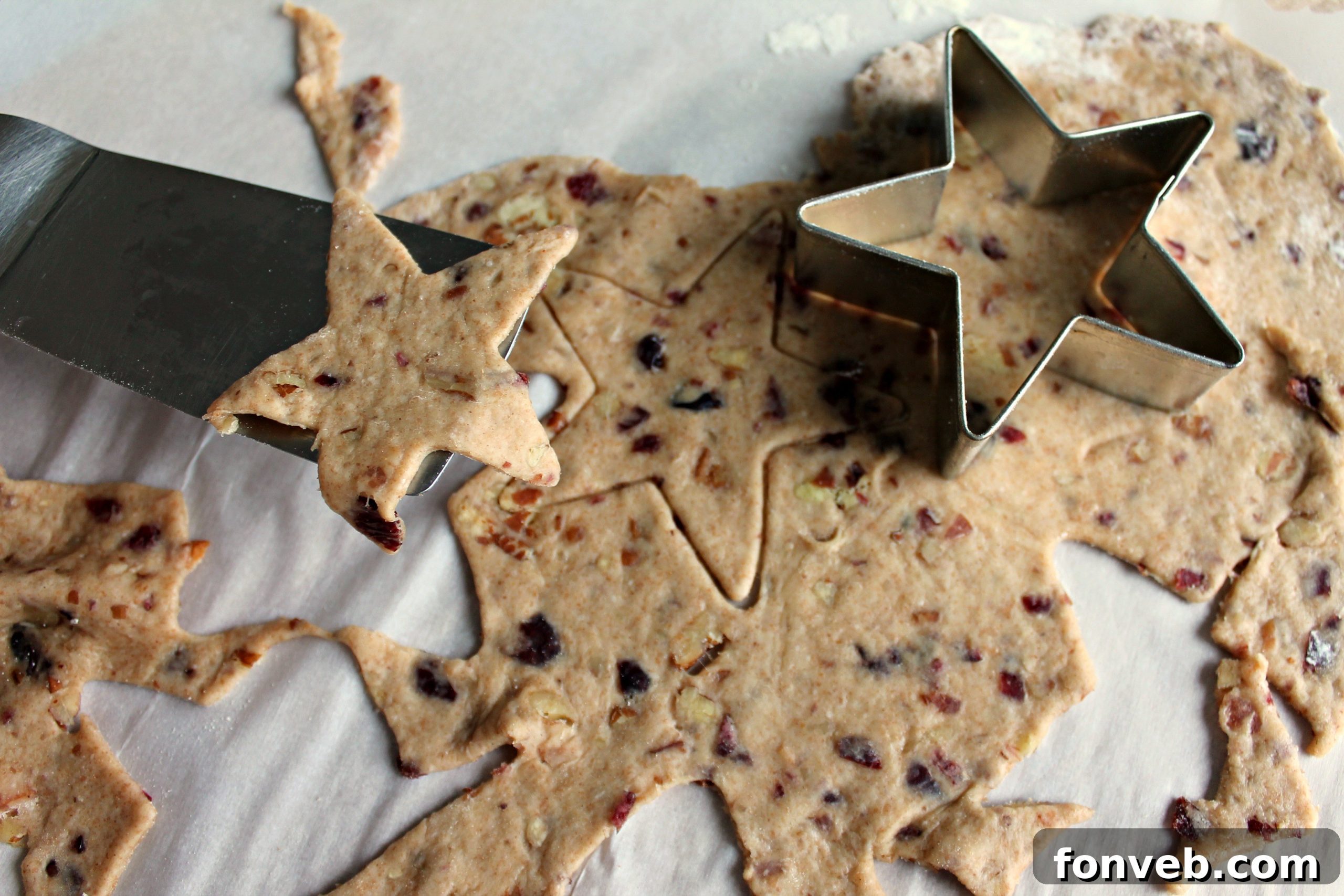 Gourmet Bacon Pecan Crisps 3 Close-up of the cracker dough being rolled out very thinly on a floured surface.
