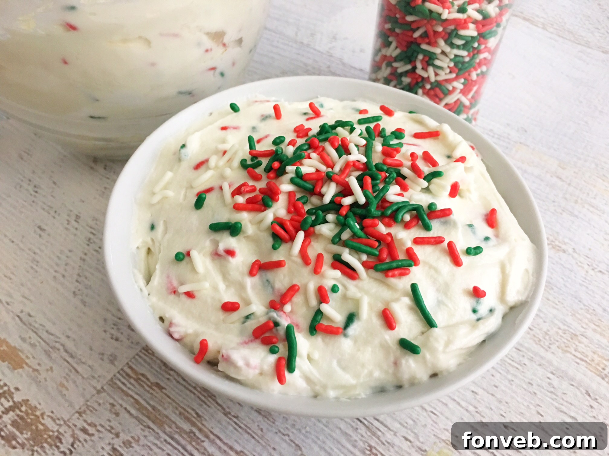 Close-up of creamy Sugar Cookie Dip with colorful sprinkles