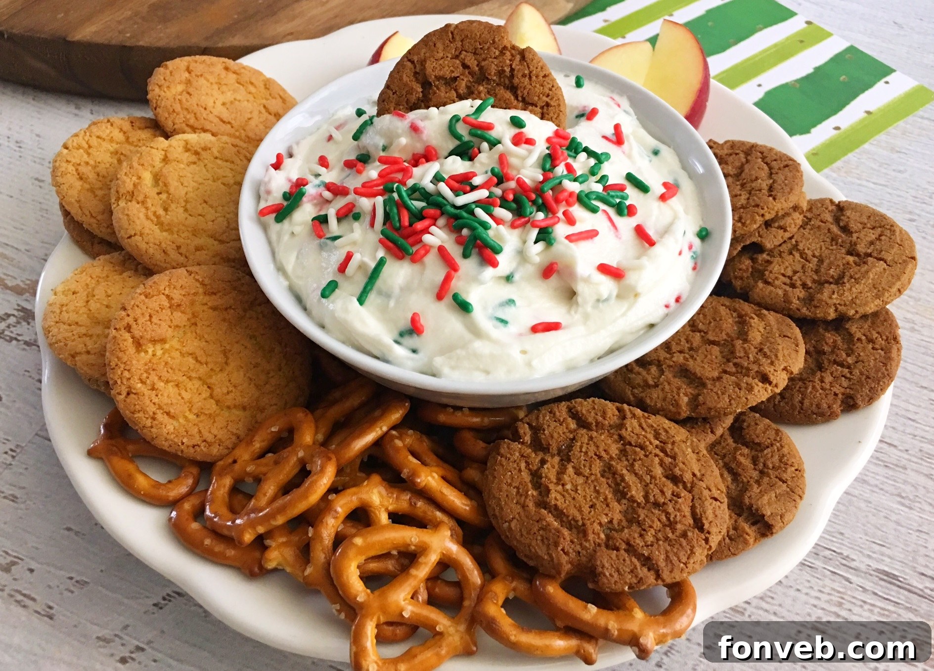 Bowl of Sugar Cookie Dip with various dippers like cookies and pretzels